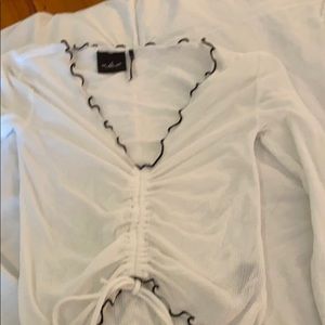 Out from under top made by Urban Outfitters.